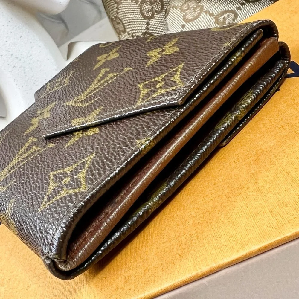 Louis Vuitton Brown Monogram Bi-Fold Snap Wallet